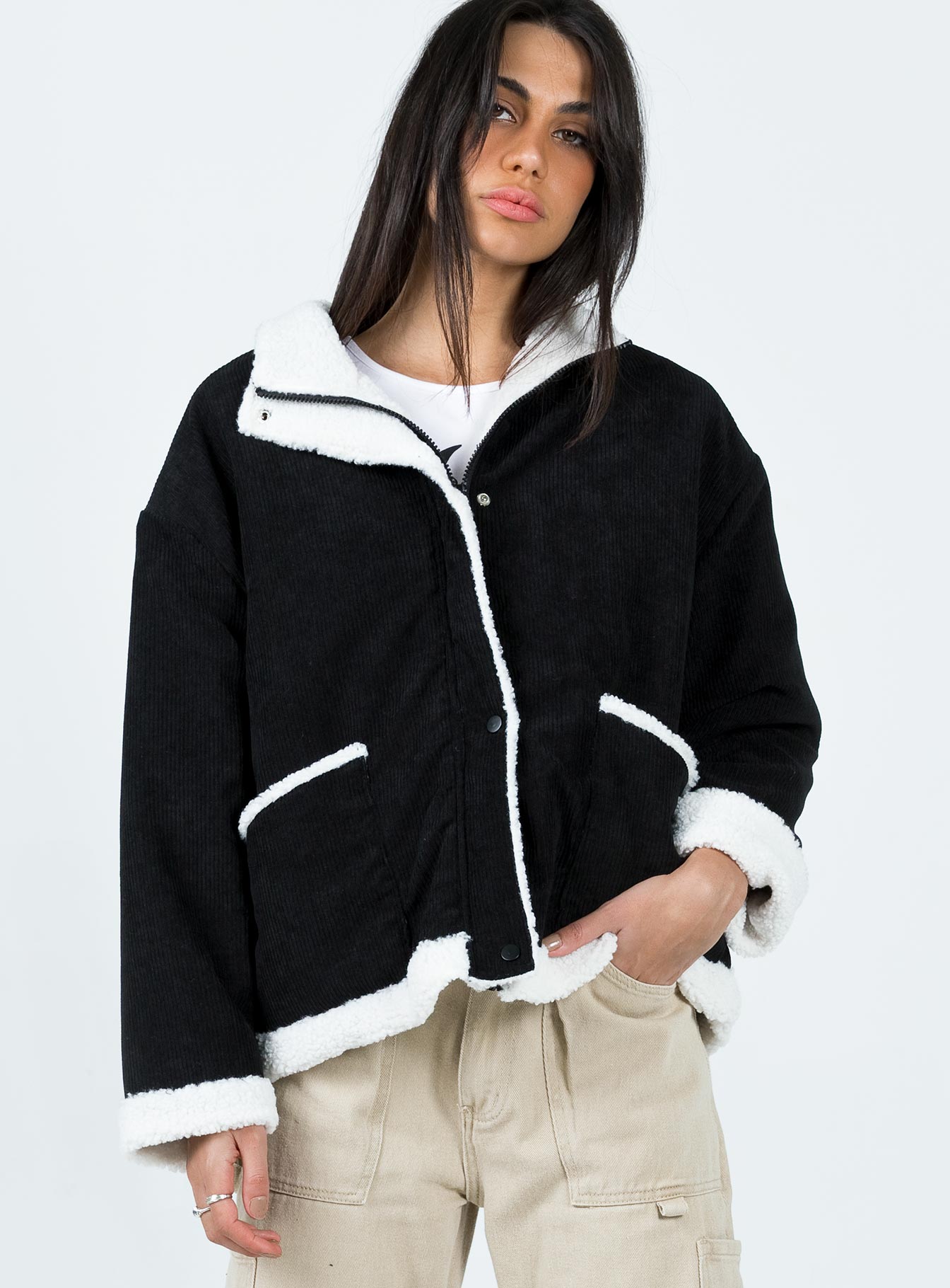 Jacket Corduroy material Faux fur lining & trim High neck Zip & button fastening at front Twin hip pocket