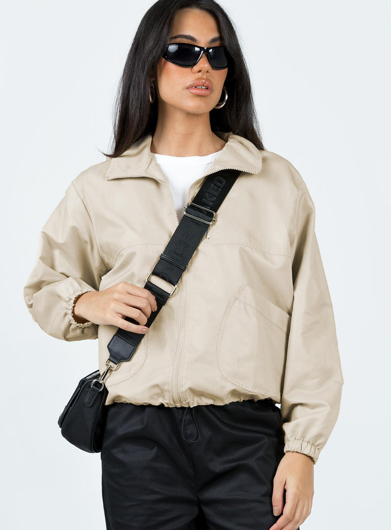 Jacket High neck Zip fastening at front Faux zip chest pocket  Twin hip pockets Drawstring waist Elasticated cuffs