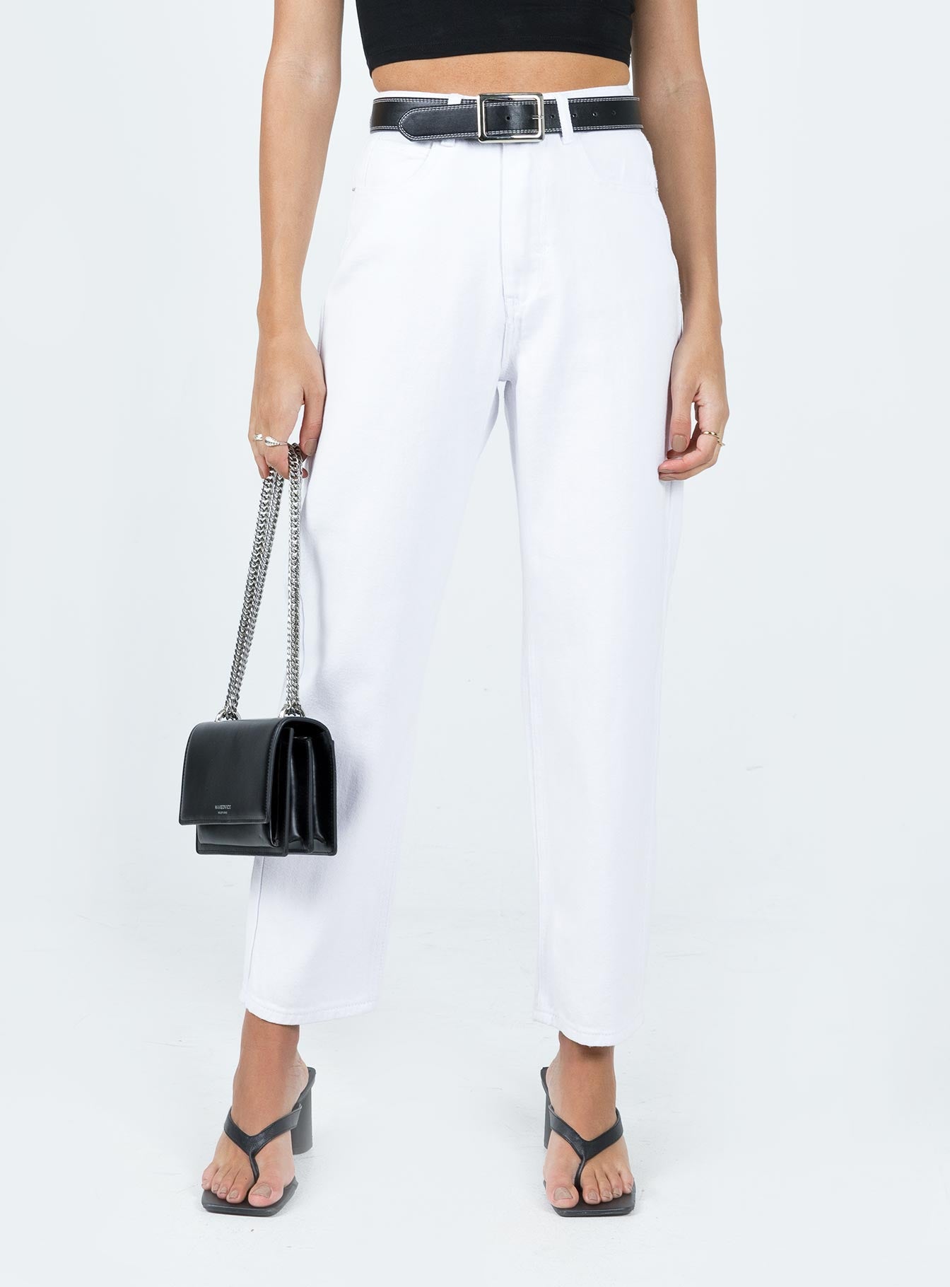 Front view of model wearing  front Princess Polly High Waisted  Leta Straight Leg Denim Jeans White