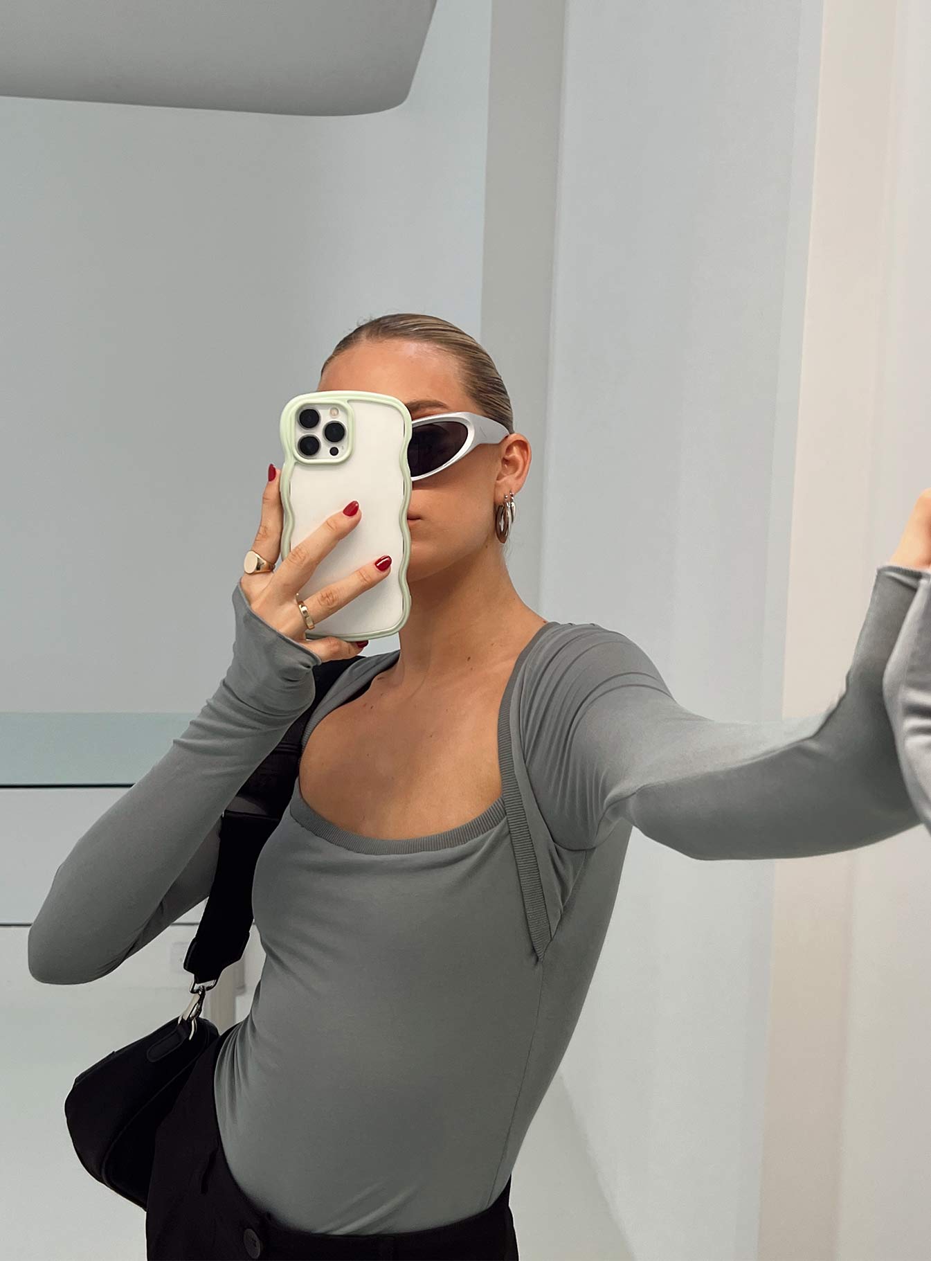 side view of model wearing Princess Polly Kentwell Bolero Bodysuit Slate Full Sleeves 