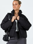 Oversized puffer jacket High neck  Zip front fastening  Twin hip pockets 