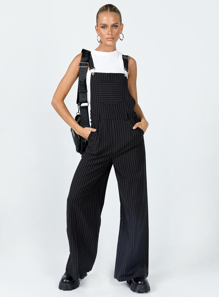 Overalls Oversized fit Pinstripe print  Adjustable shoulder straps  Single chest pockets  Belt looped waist  Four classic pockets  Invisible zip fastening at side  Wide leg 