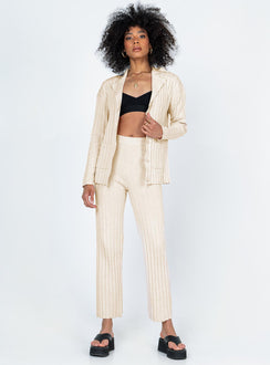 Matching set  Relaxed fit Princess Polly Exclusive 63% recycled polyester 25% polyester 12% nylon Heavy wide ribbed material  Long sleeve button up top   Twin front pockets  High waisted pants  Elasticated waistband Slim leg  Raw-edge hem 