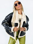 Oversized jacket Faux leather material Faux fur lining  Buckle fastening at neck  Press buttons Zip front  Fully lined 