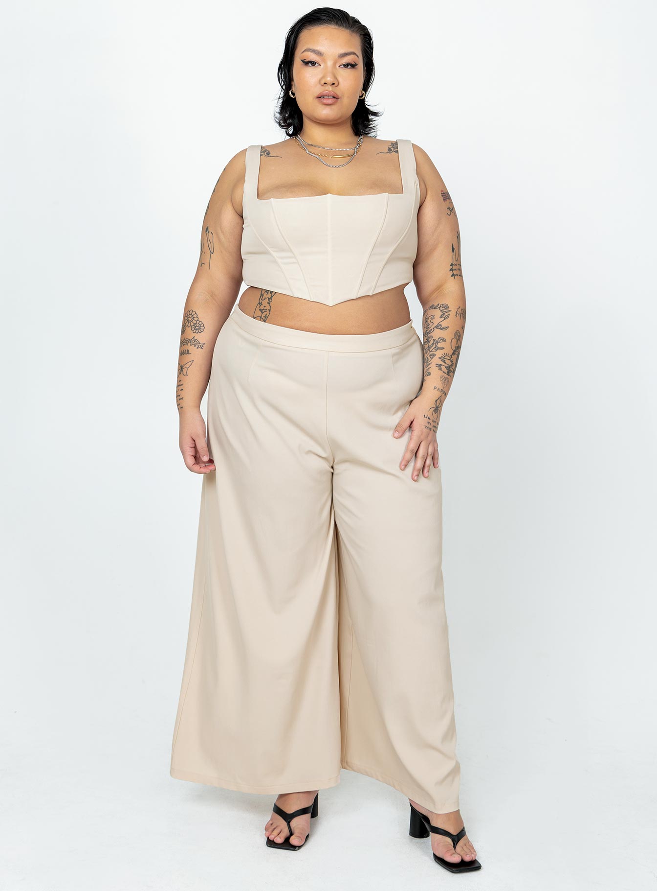 Matching set Corset top  Fixed straps Boning through front  Pointed hem Zip fastening at back  High waisted pants  Invisible zip fastening at side  Wide leg 