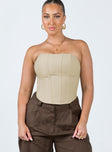 Corset top Linen material Boning throughout  Zip fastening at back Inner silicone strip at bust Curved hem