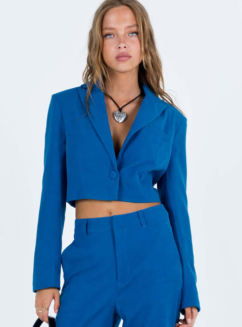 Blue blazer Ribbed material Lapel collar Single button fastening at front Chest pocket Padded shoulders