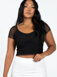 Black crop top V neckline Mesh capped sleeves Good stretch Lined body