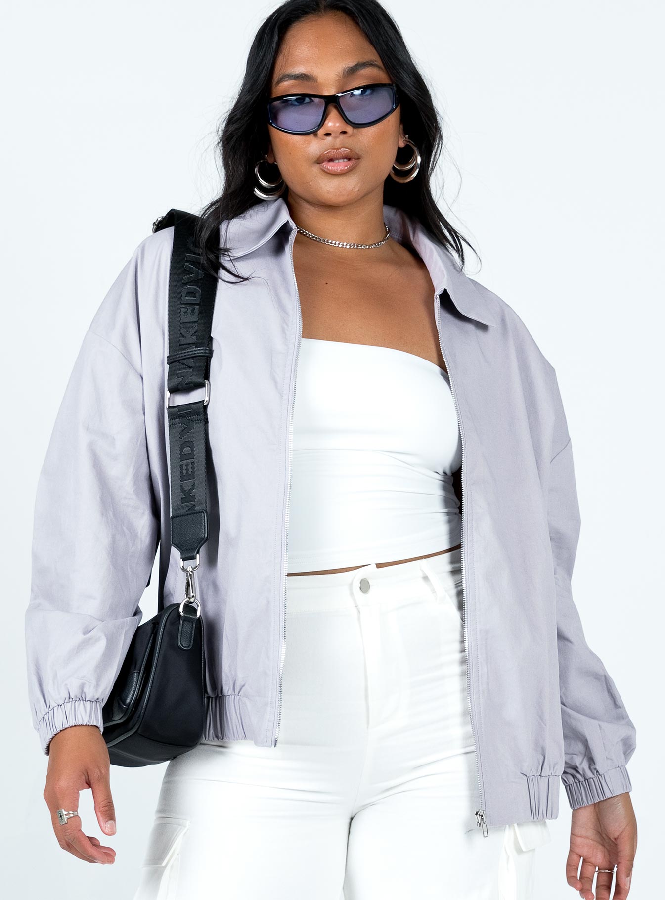 Relaxed fit jacket Lightweight material  Classic collar  Silver-toned hardware  Zip front fastening  Twin hip pockets  Elasticated cuffs & waistband 