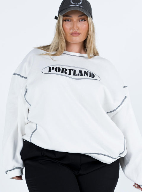 side view of model wearing Princess Polly Portland Oversized Sweatshirt White Curve regular 