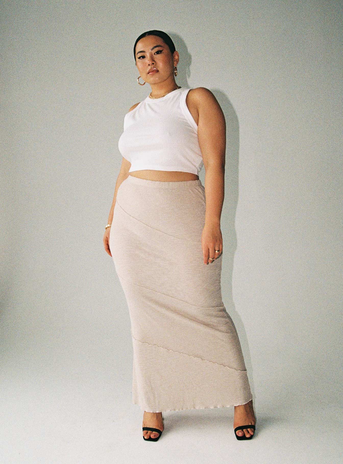   front view of model wearing Princess Polly Oscar Maxi Skirt Beige Curve Maxi 