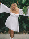 Front view of model wearing  front Princess Polly Square Neck  Halle Mini Dress White Curve