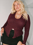 Maroon long sleeve top Ribbed knit material  Low cut neckline  Split front hem  Good stretch  Unlined 