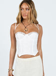 Corset top Anglaise material  Lace trimming  Adjustable shoulder straps  Tie up halter neck  Wired cups 