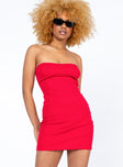 Front view of model wearing  front Princess Polly Asymmetric Neckline  Iva Mini Dress Red