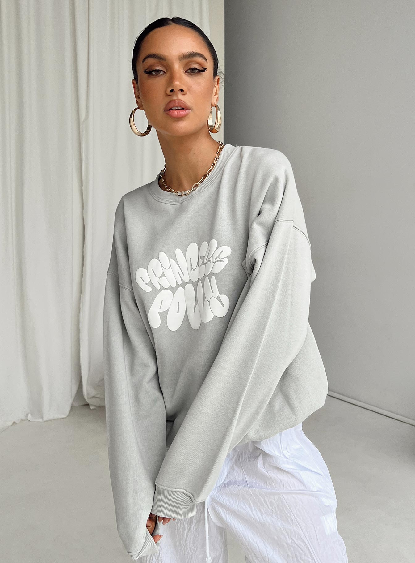 back view of model wearing Princess Polly Princess Polly Crew Neck Sweatshirt Bubble Text Grey / Cloud White Long 