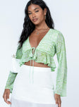 Green long sleeve top 100% polyester  Chiffon material  Printed design  Plunging neckline  Tie front fastening  Frill hem  Flared sleeves  Non-stretch Lined bust 