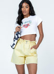 Yellow shorts 100% cotton Denim material  Elasticated paper bag waistband Zip and button fastening Four-pocket design Frayed hemline