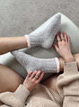Socks  Fluffy material  Above the ankle length  Good stretch  Unlined 