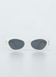 Sunglasses 95% plastic 5% metal UV 400 Hexagon frame  Moulded nose bridge  Black tinted lenses  Gold-toned hardware 