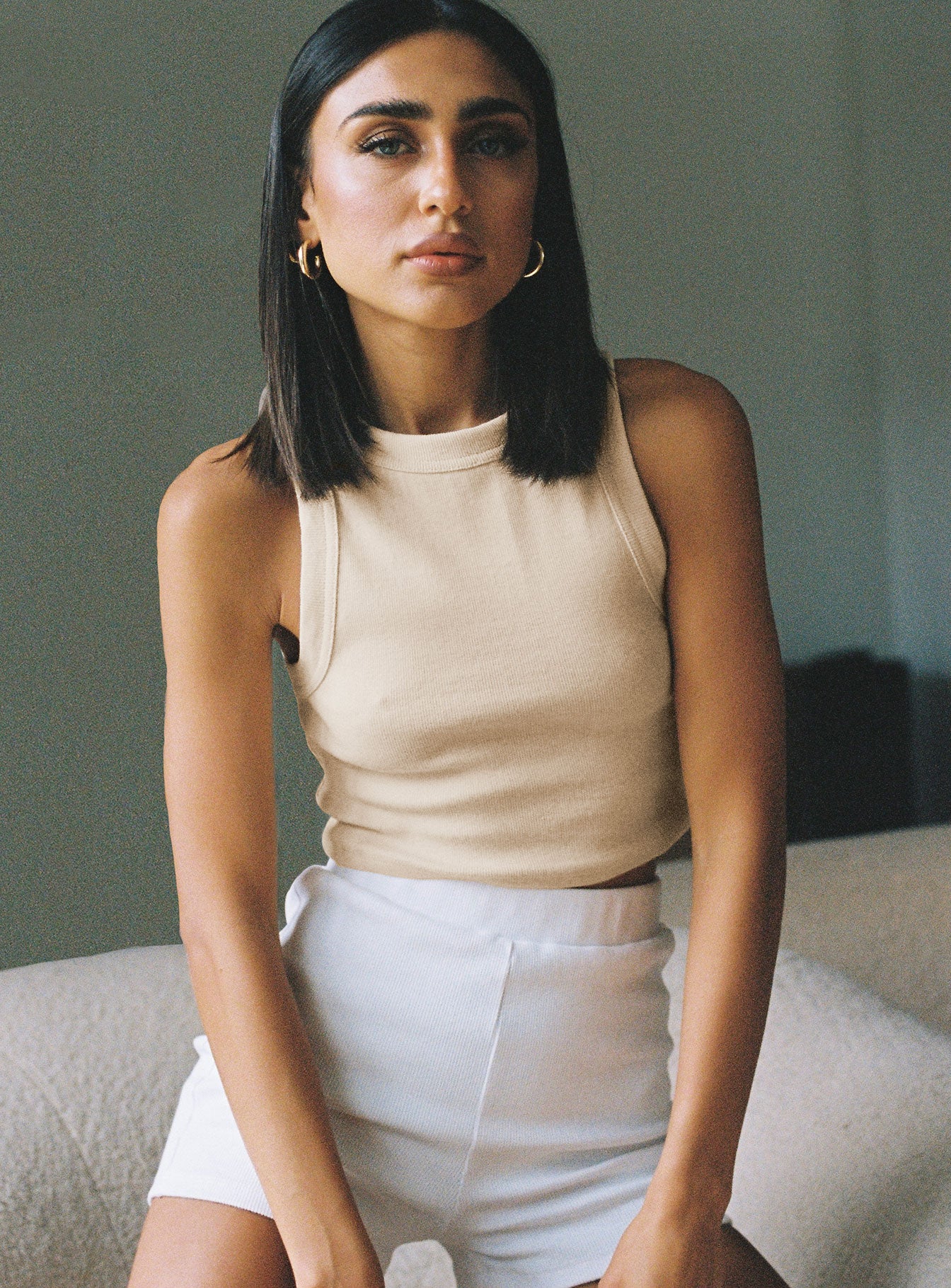 front view of model wearing Princess Polly Classic Tank Top Cream 