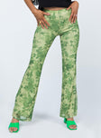 side view of model wearing Princess Polly Motel Heny Trouser Blurred Floral Green 