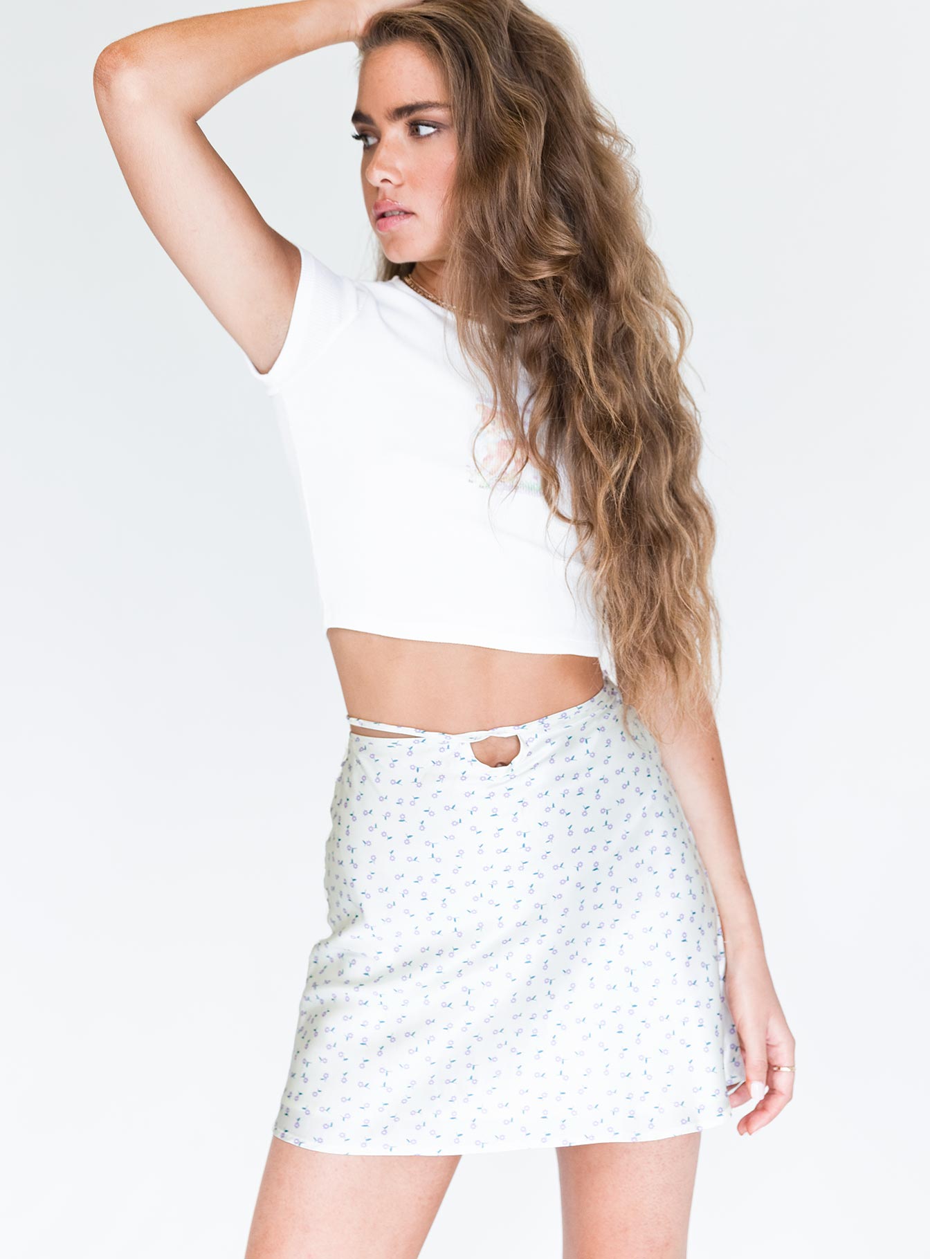   front view of model wearing Princess Polly Desert Storm Mini Skirt White Floral 