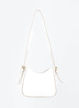 Crossbody bag Faux leather material Gold-toned hardware Adjustable & removable crossbody strap Zip fastening Flat base