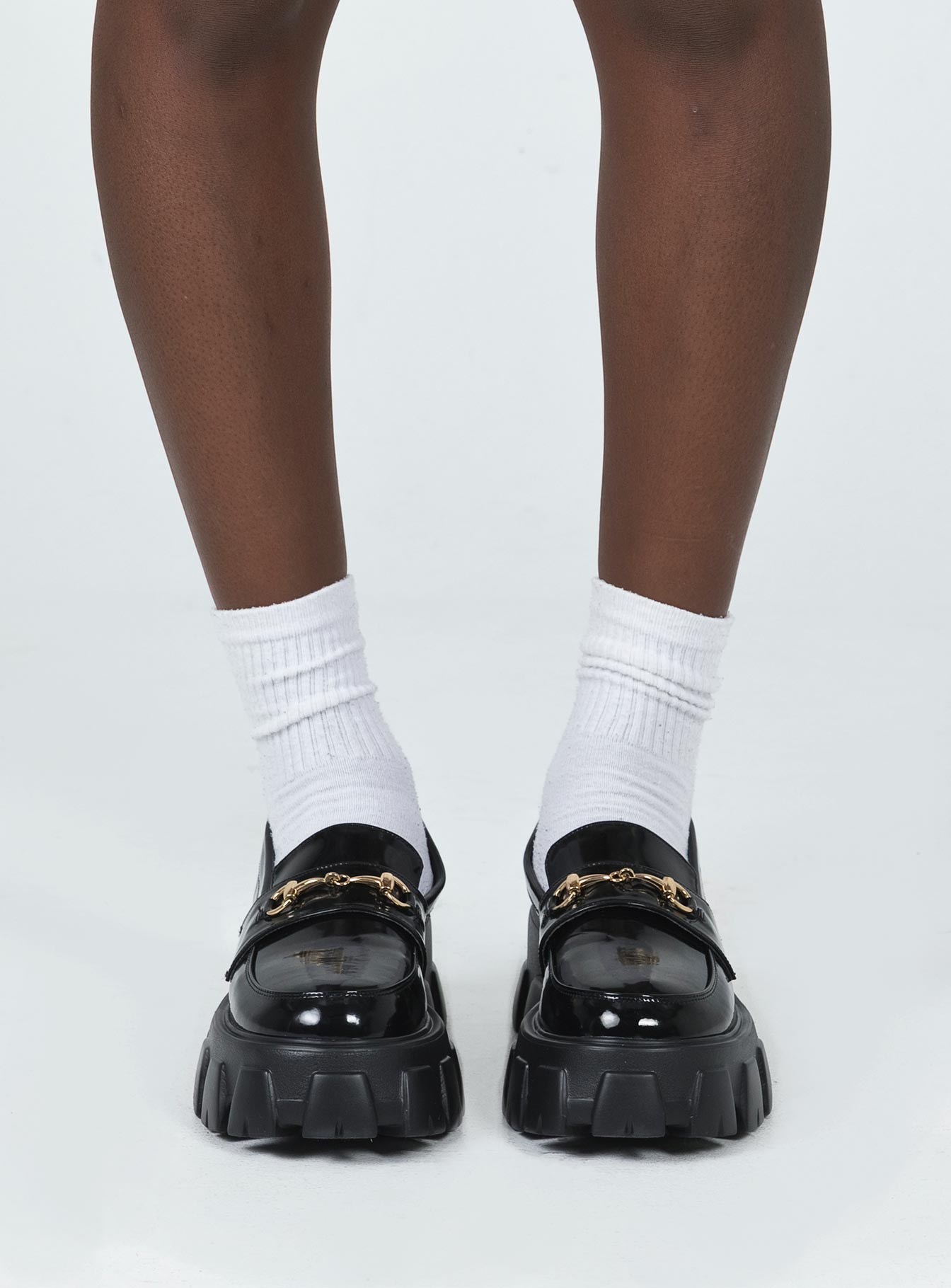 Loafers Faux patent leather Platform base Treaded sole Gold-toned snaffle detail Rounded toe