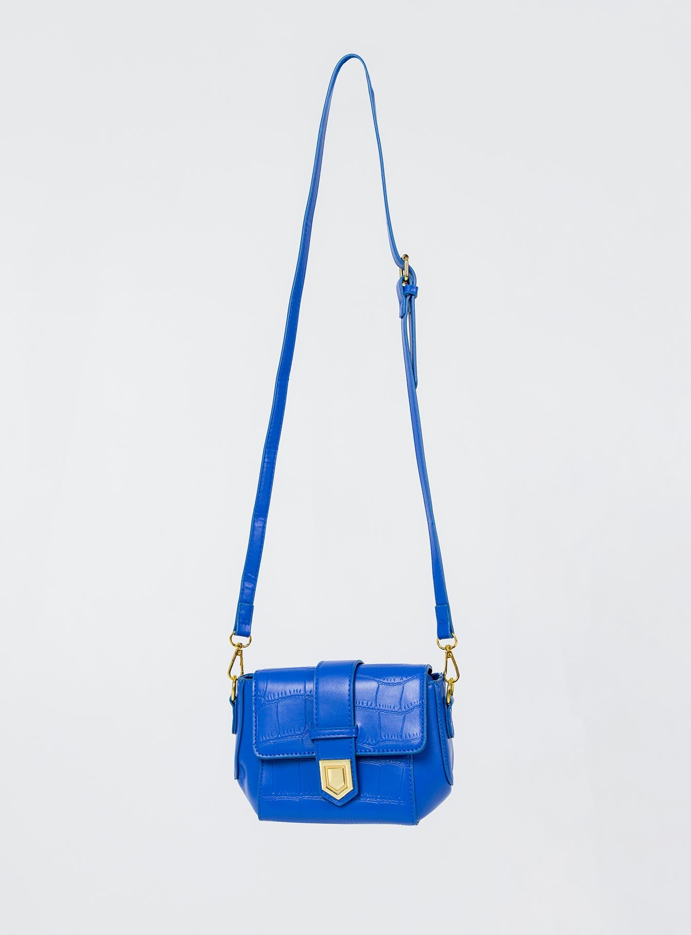 Crossbody  100% PU Faux croc leather  Magnetic button fastening  Removable & adjustable crossbody strap  Flat base 