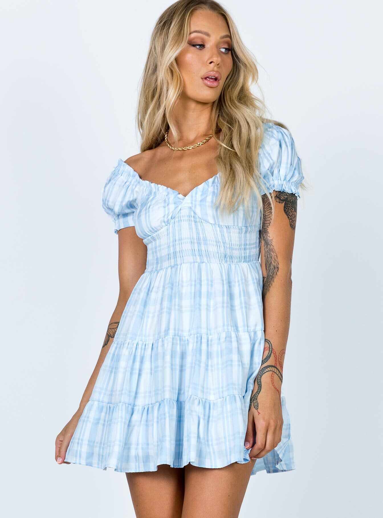 side view of model wearing Princess Polly Daniela Mini Dress Blue Check 