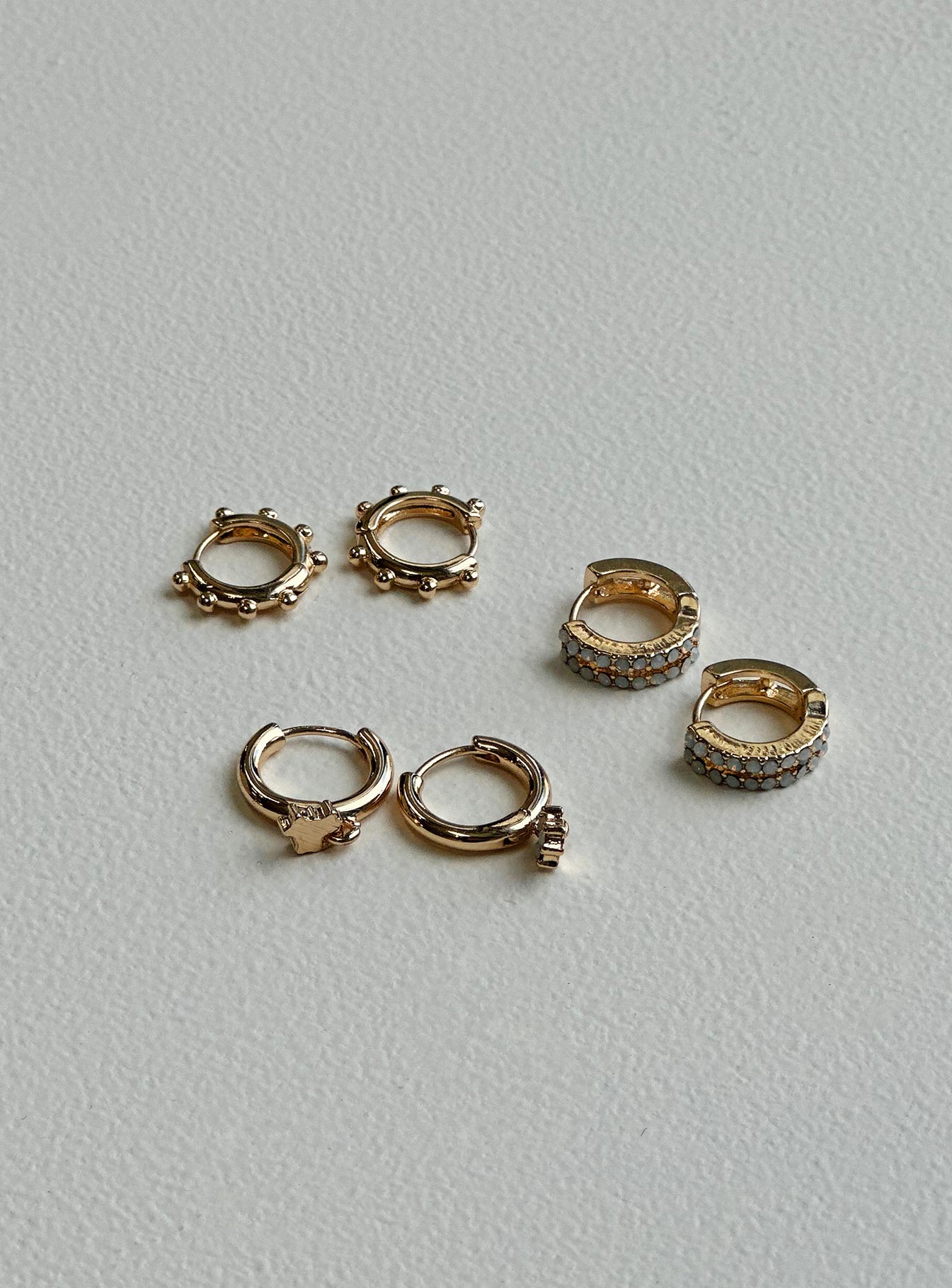 Earring pack Pack of three sets Hoop fastening Gold toned Gemstone detail