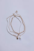 Necklace set Pack of three Faux pearl detail Drop down charm Lobster clasp fastening Gold-toned