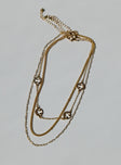 Necklace pack 60% brass 40% zinc alloy  Pack of three - these can be worn separately  Gold-toned  Lobster clasp fastening 