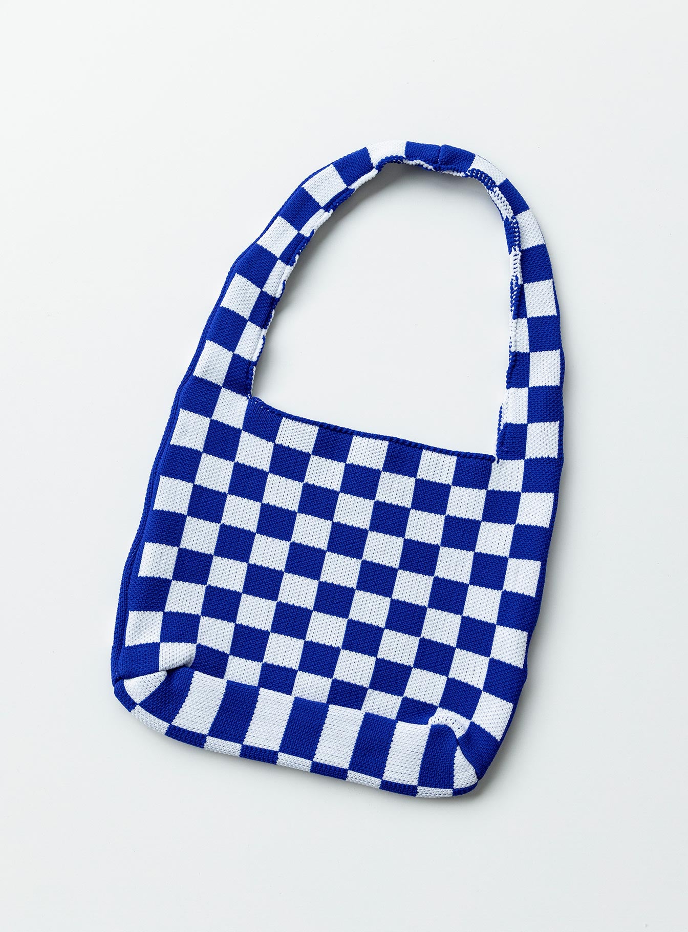 Bag 100% polyester Knit material  Checkerboard print  Single strap  One main compartment  Flat base 