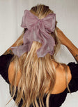 Hair bow  95% polyester 5% iron Sheer sparkly material  Silver-toned hardware  Snap clip fastening 