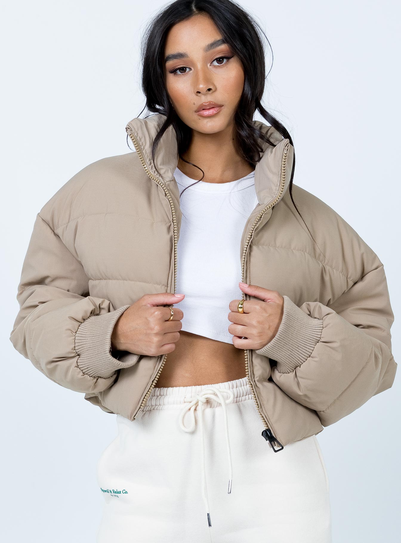 Puffer jacket Oversized fit Zip front fastening High neckline Relaxed sleeves with elasticated cuffs Single internal pocket Fully lined