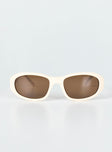 Sunglasses Princess Polly Exclusive 50% polycarbonate 30% cellulose propionate 20% copper Rounded frame Moulded nose bridge Brown tinted lenses