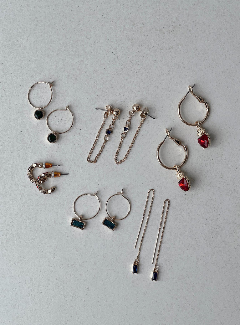 Earring set Set includes six pairs Each pair is different Coloured gems Gold toned hardware