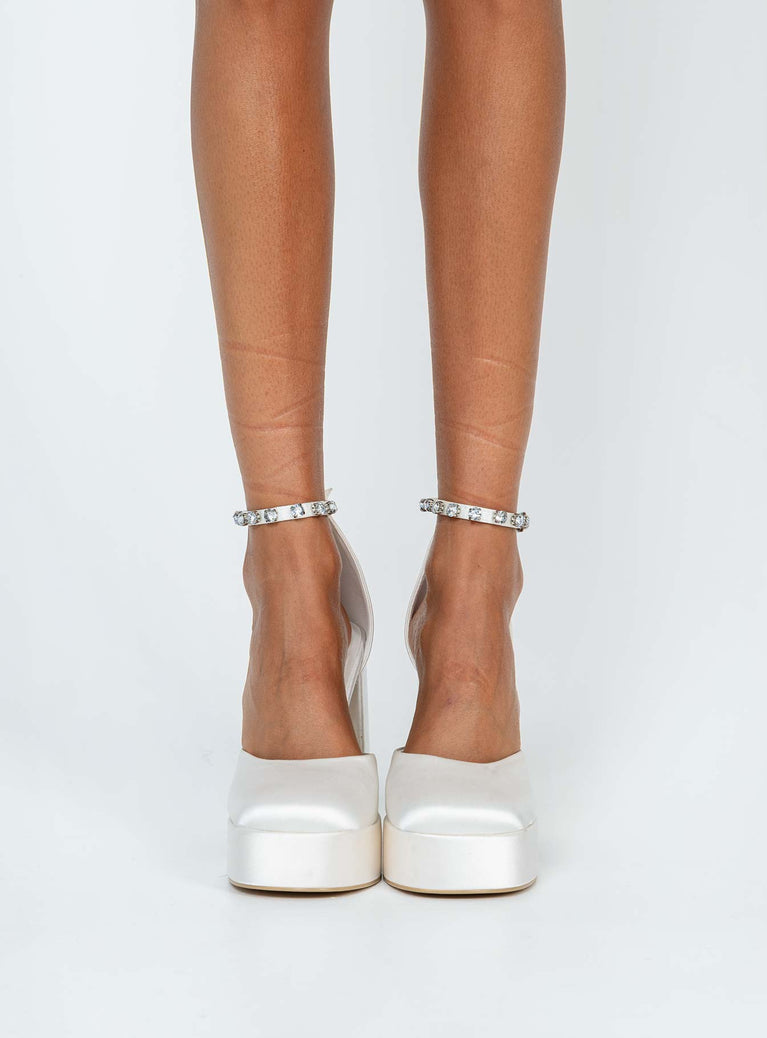Heels Silky material  Diamante detail  Ankle strap  Square toe  Block heel  Platform base  Padded footbed 
