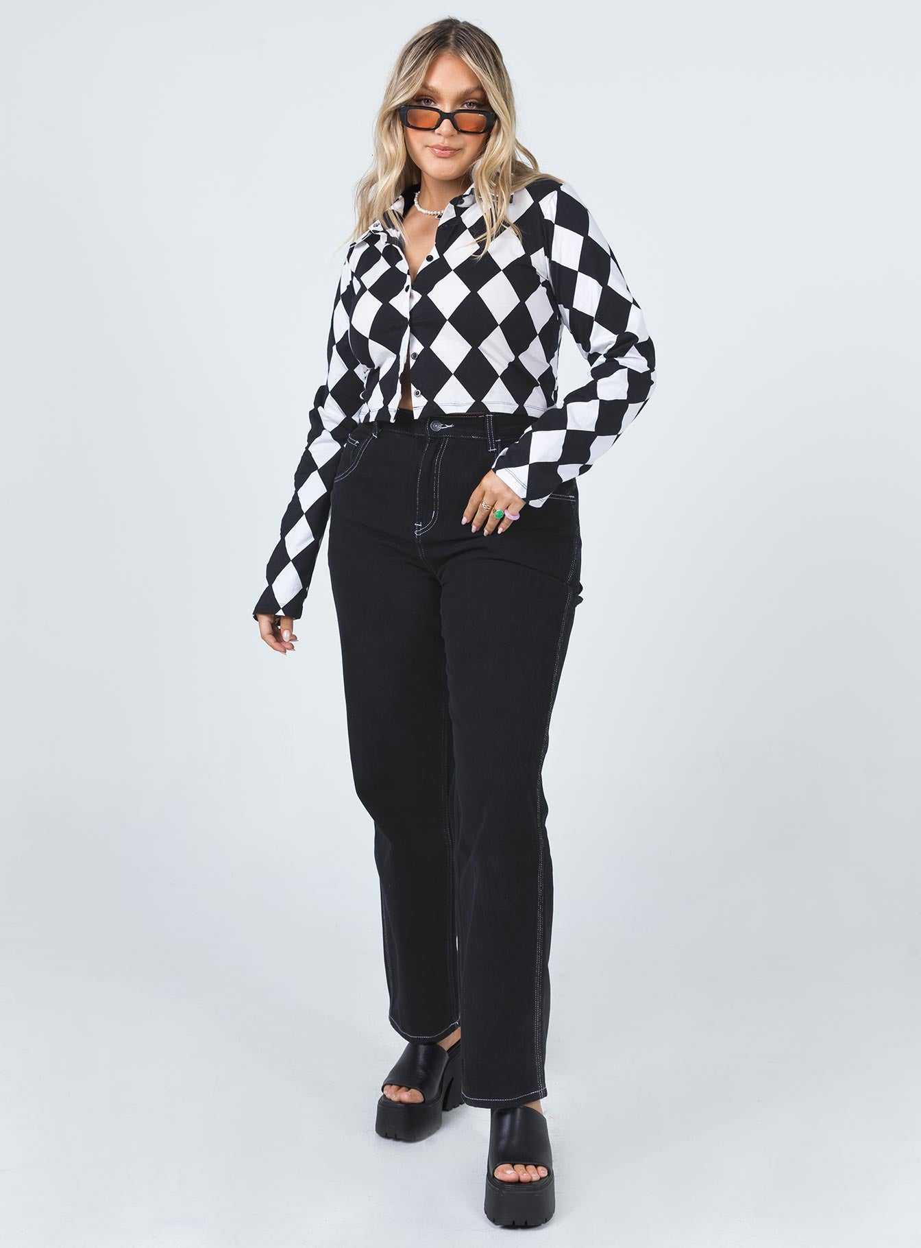 front view of model wearing Princess Polly Motel Carpenter Jeans Black Mid Rise 