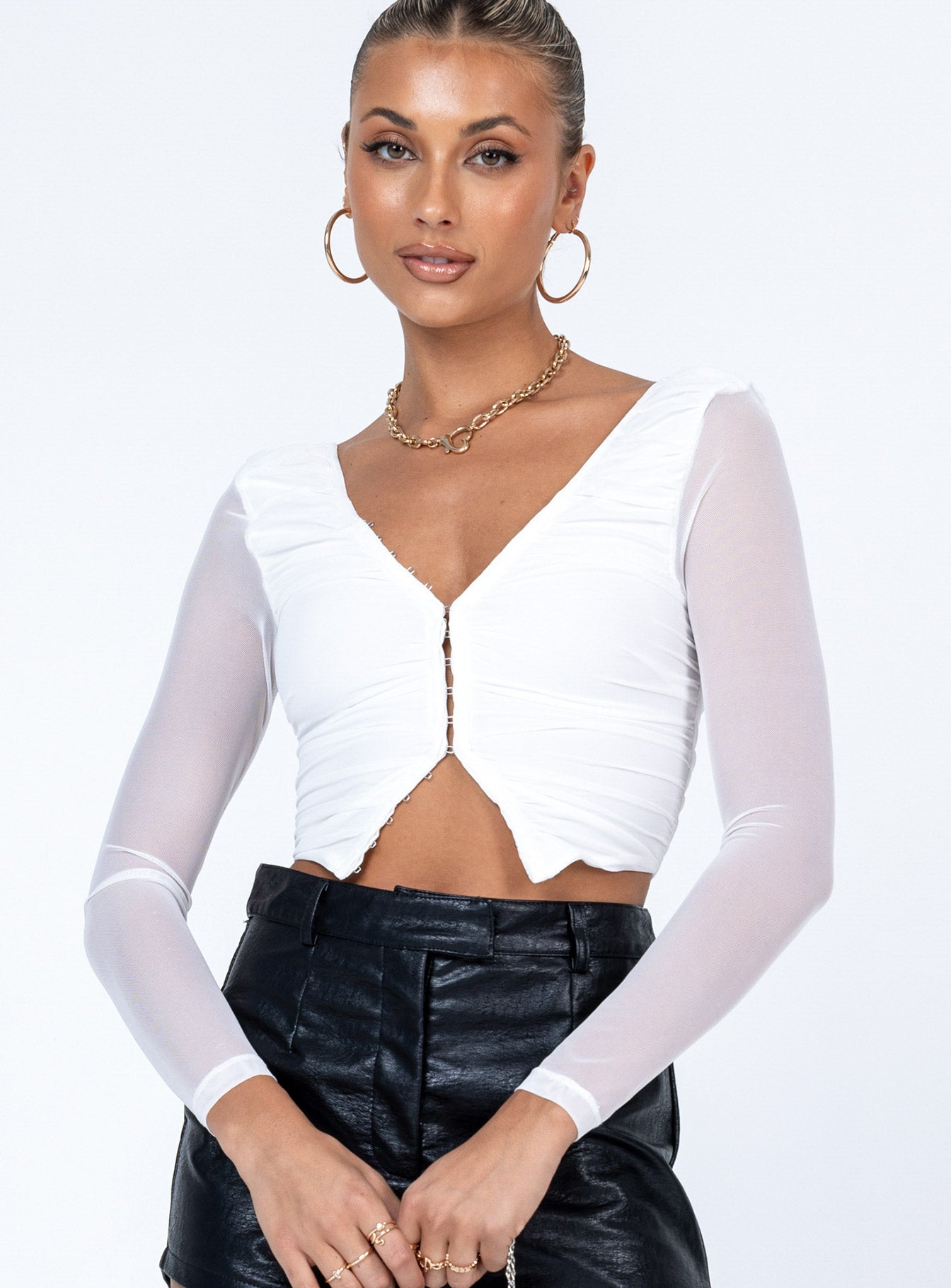 front view of model wearing Princess Polly Lillian Long Sleeve Top White Full Sleeves V-Neck 