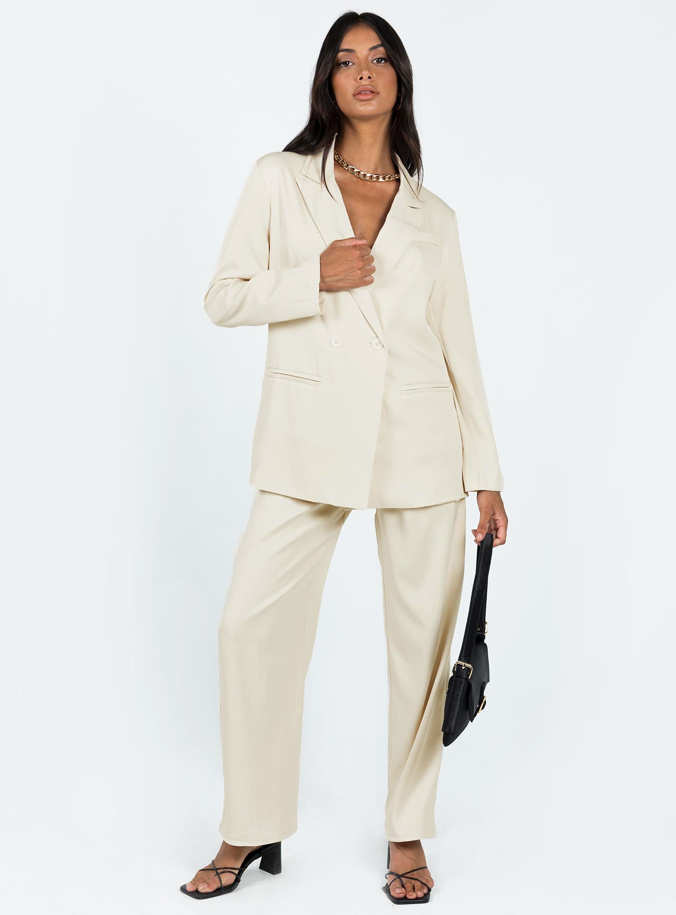 Blazer Silky material  Lapel collar  Double-breasted  Twin hip pockets  Non-stretch 