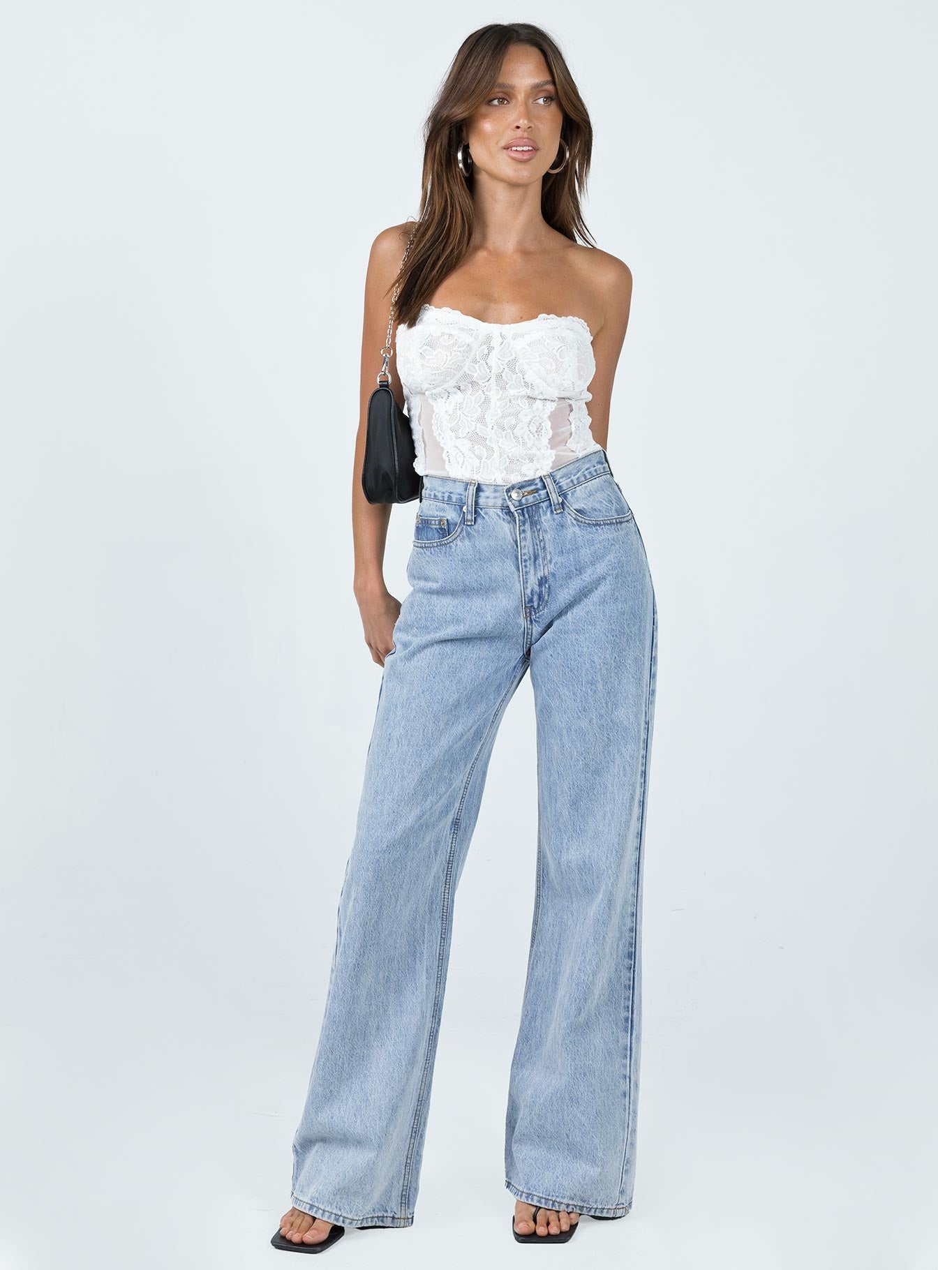 side view of model wearing Princess Polly Radu Strapless Bodysuit White Sleeveless Sweetheart 