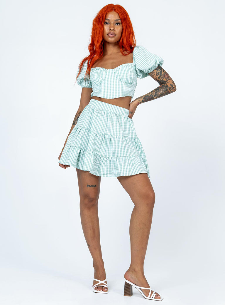 Matching set Gingham print  Crop top  Puff sleeves  Back tie fastening  Shirred back  High waisted mini skirt  Elasticated waistband  Lined top 