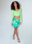   side view of model wearing Princess Polly Tuscany Mini Skirt Green 