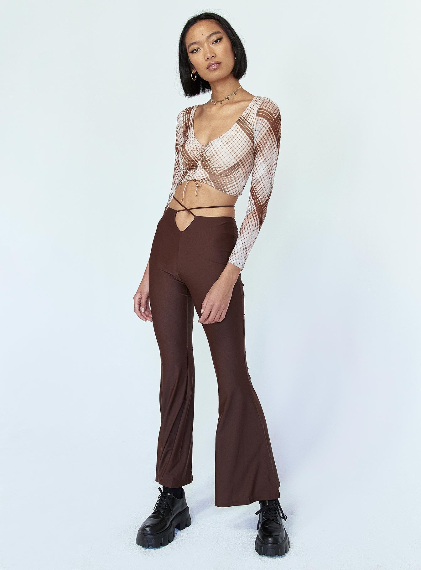side view of model wearing Princess Polly Cooper Tie Waist Pants Brown 