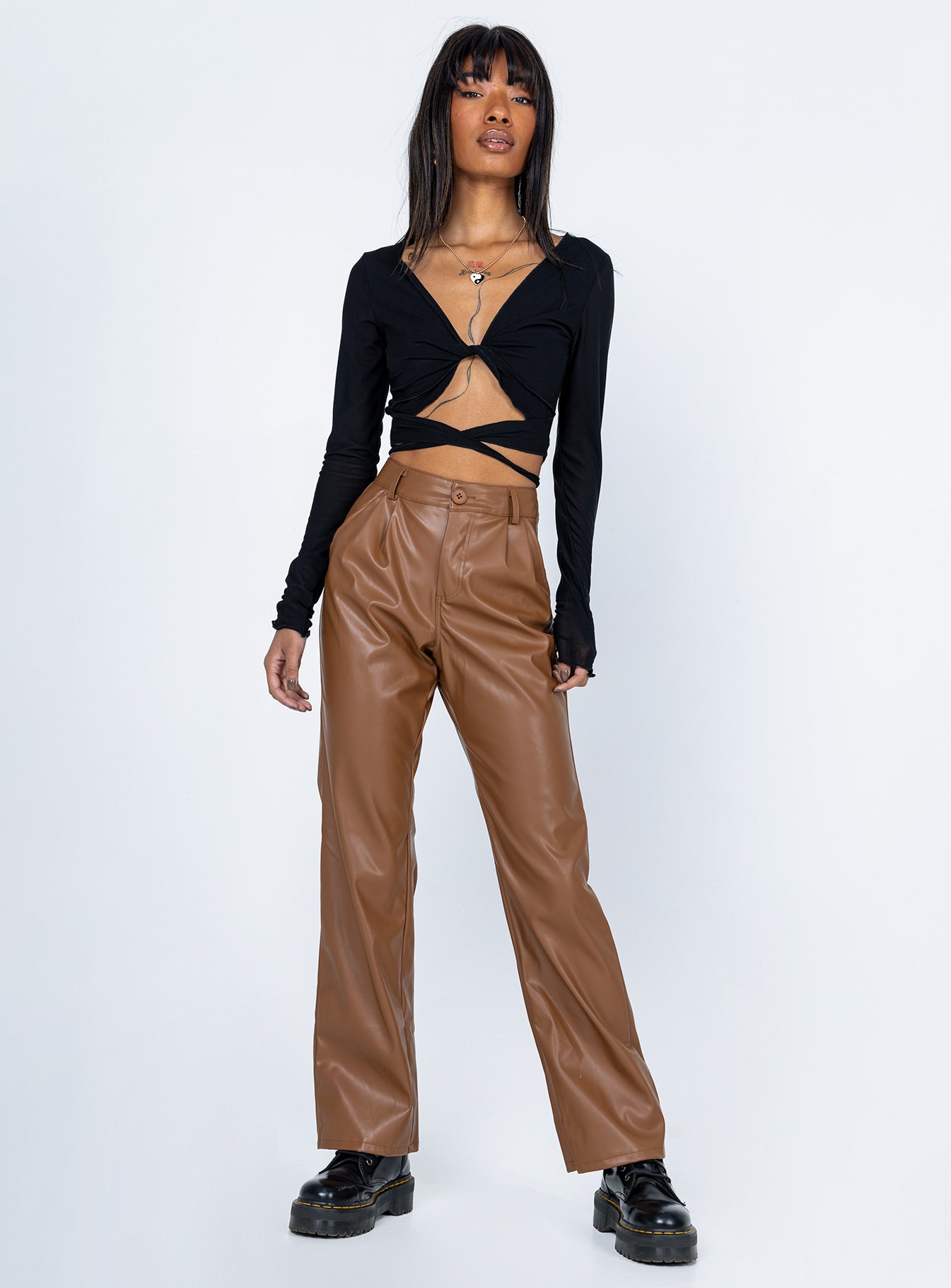 front view of model wearing Princess Polly Caiden Long Sleeve Top Black 