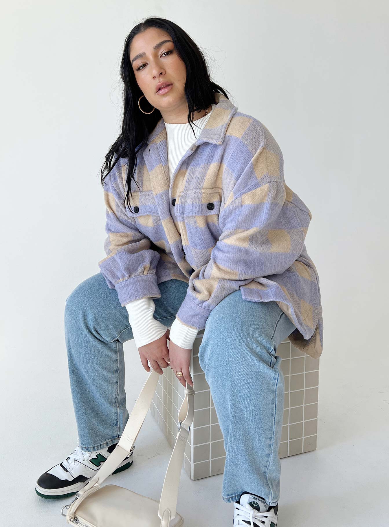 Oversized jacket Check print Button front fastening Classic collar Large chest pocket Scoop step hem Drop shoulder Unlined