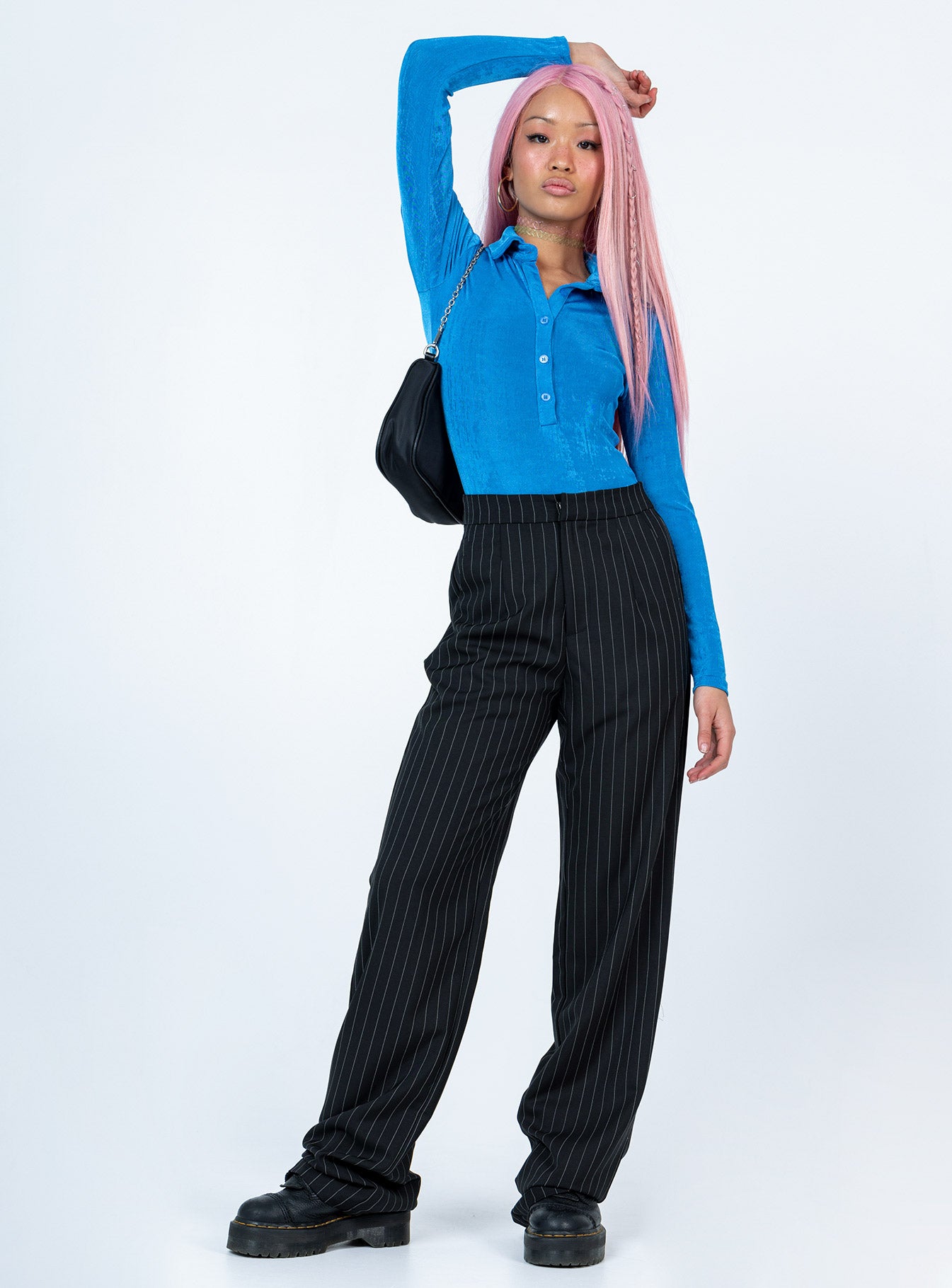 front view of model wearing Princess Polly Elody Long Sleeve Bodysuit Blue Full Sleeves V-Neck 